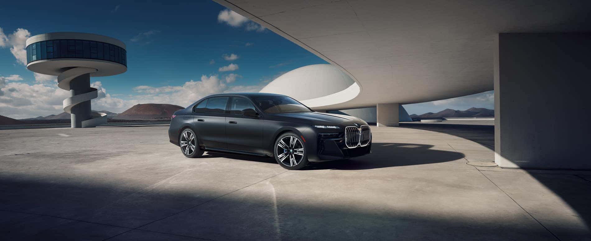 Side view of 7 series in front of futuristic landscape