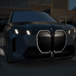 2026 BMW iX parked at night outside