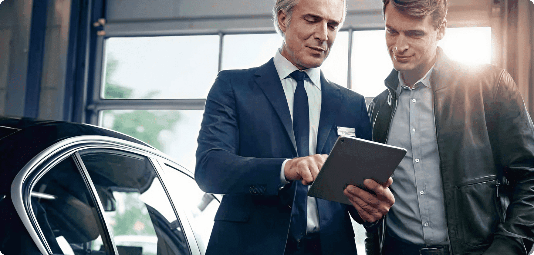BMW dealer reviewing CPO Wrap coverage with customer