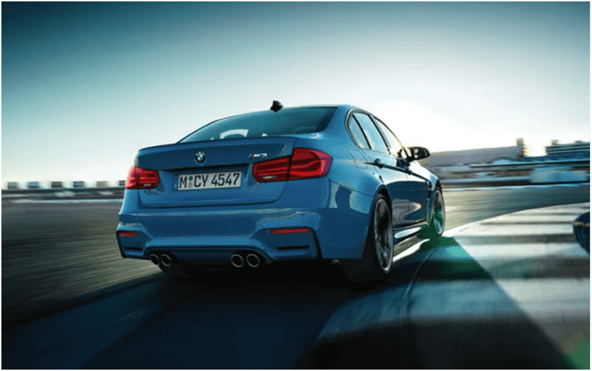 BMW driving on scenic road