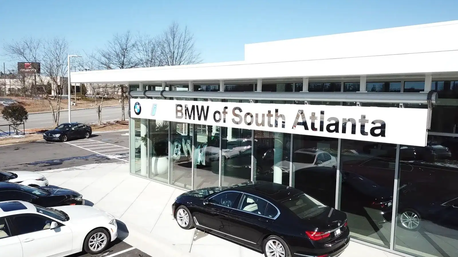 BMW of South Atlanta dealership exterior at 4171 Jonesboro Road, Union City, Georgia, with the BMW of South Atlanta storefront sign and the front service drive.