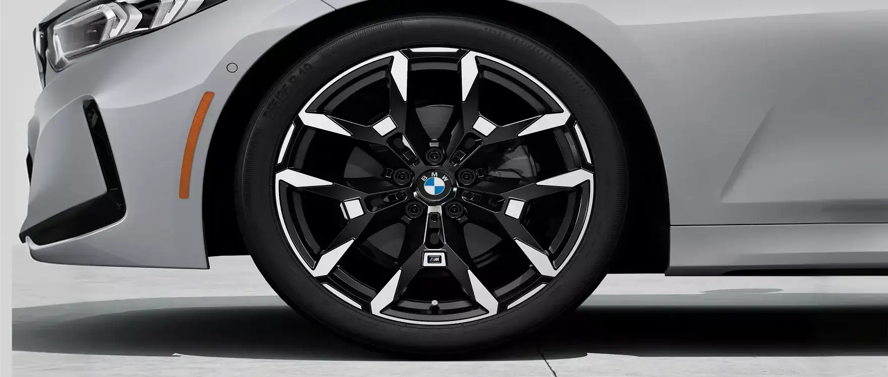 BMW vehicle receiving tire replacement service at BMW of South Atlanta