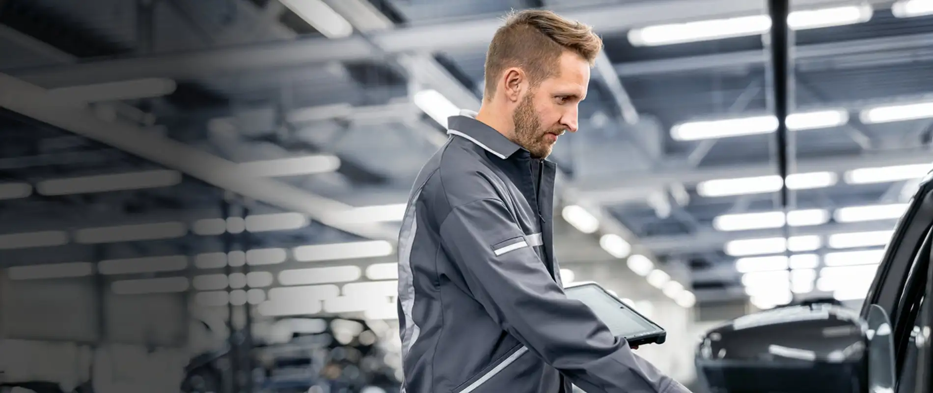 BMW factory-trained technician performing a Certified Pre-Owned inspection at BMW of South Atlanta in Union City, GA