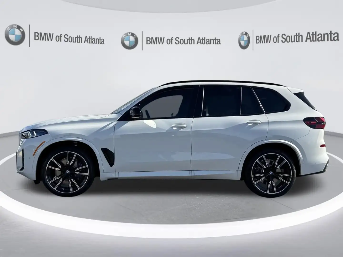 2026 BMW X5 M60i side profile with 21-inch M wheels