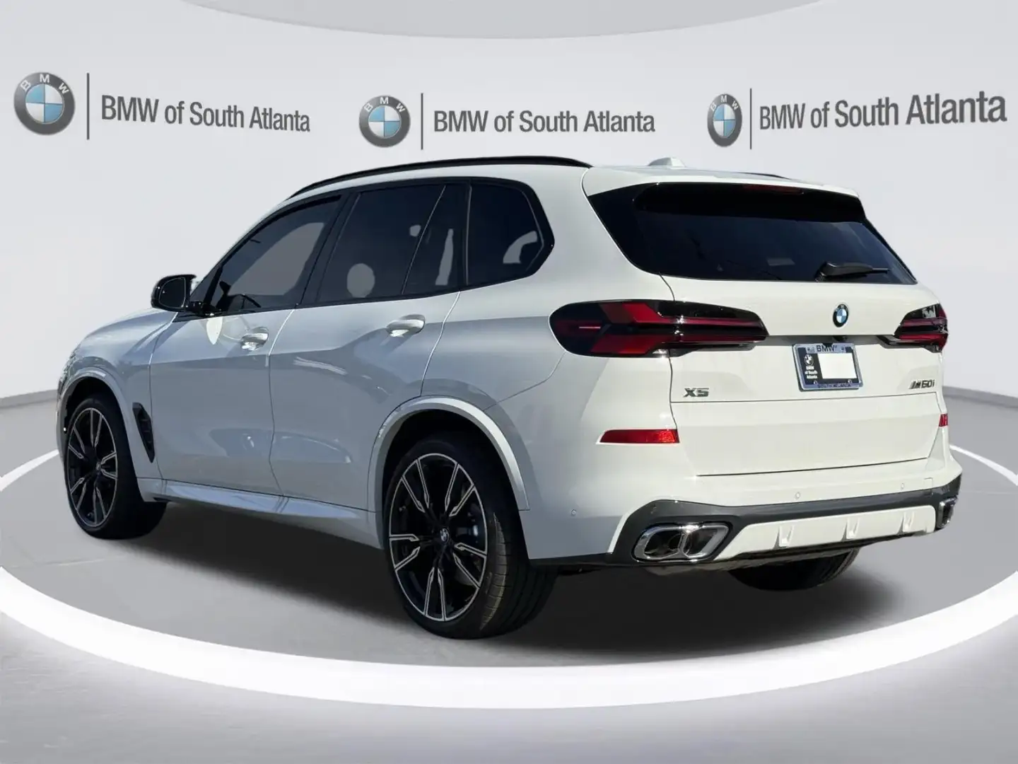 2026 BMW X5 M60i rear three-quarter