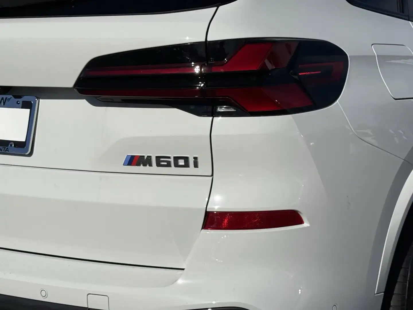 M60i badge on the tailgate — the twin-turbo V8 M Performance X5