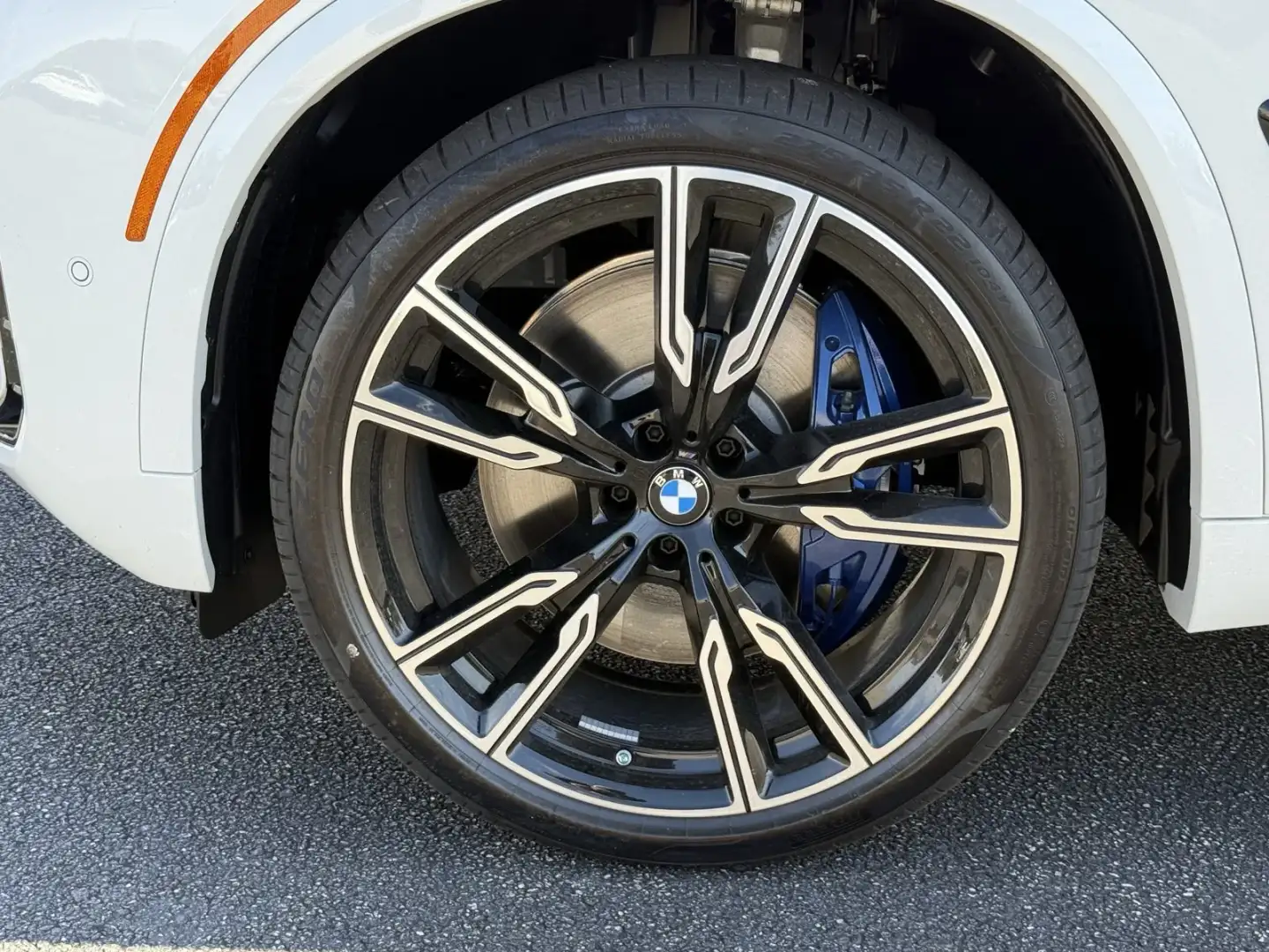 M wheel with blue M Sport brake caliper