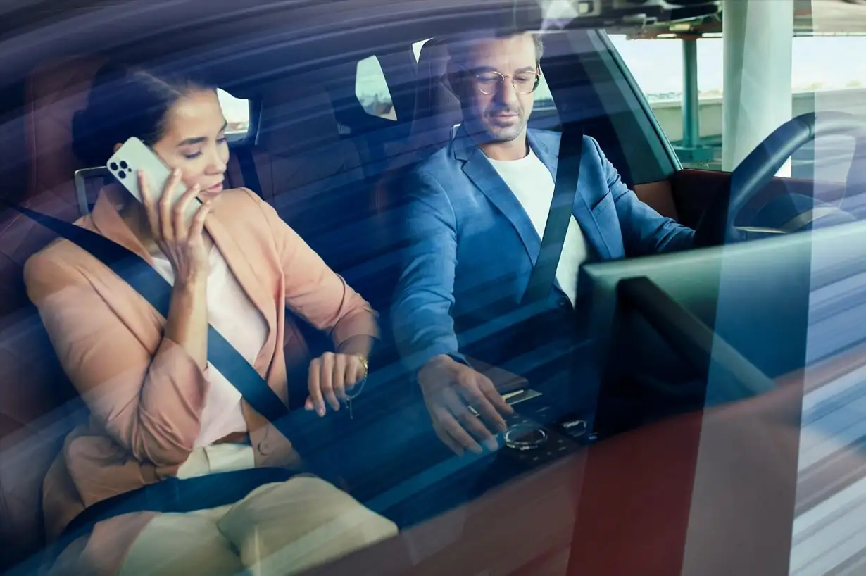 Two professionals in a BMW — the credit-tier and pre-approval conversation BMW of South Atlanta walks Atlanta buyers through