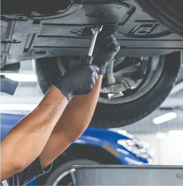 BMW technician installing and registering a Genuine BMW AGM battery at BMW of South Atlanta