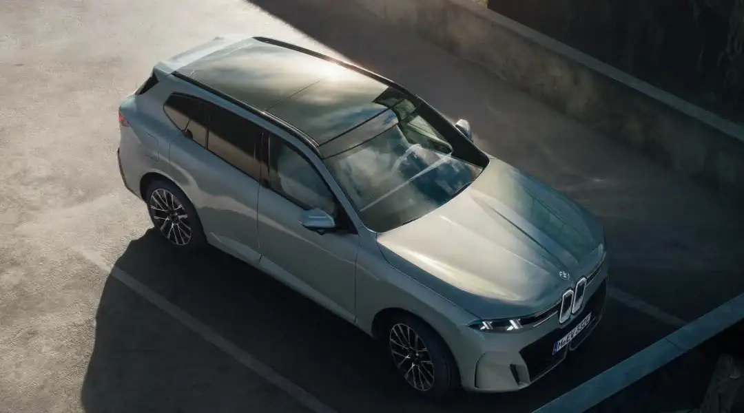 A BMW electric SUV seen from above on a ramp