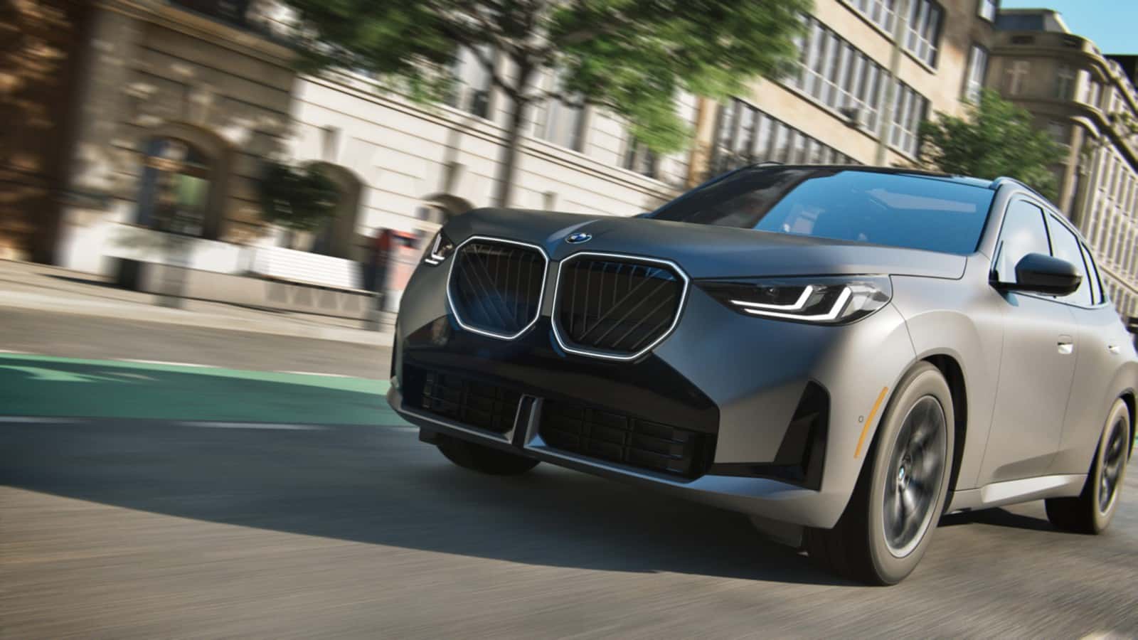 BMW X3 tracking straight down a sunlit city street, the steering feel proper alignment preserves