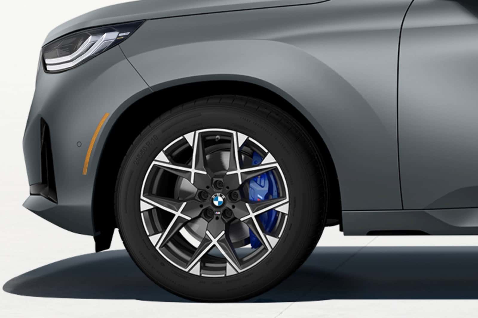 Close-up of a BMW M light-alloy wheel and performance tire, the investment a proper alignment protects