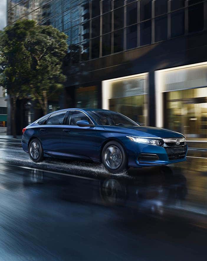comparison-of-the-2020-Civic-and-the-2020-Accord-Massachusetts | Blue 2020 accord running on the road