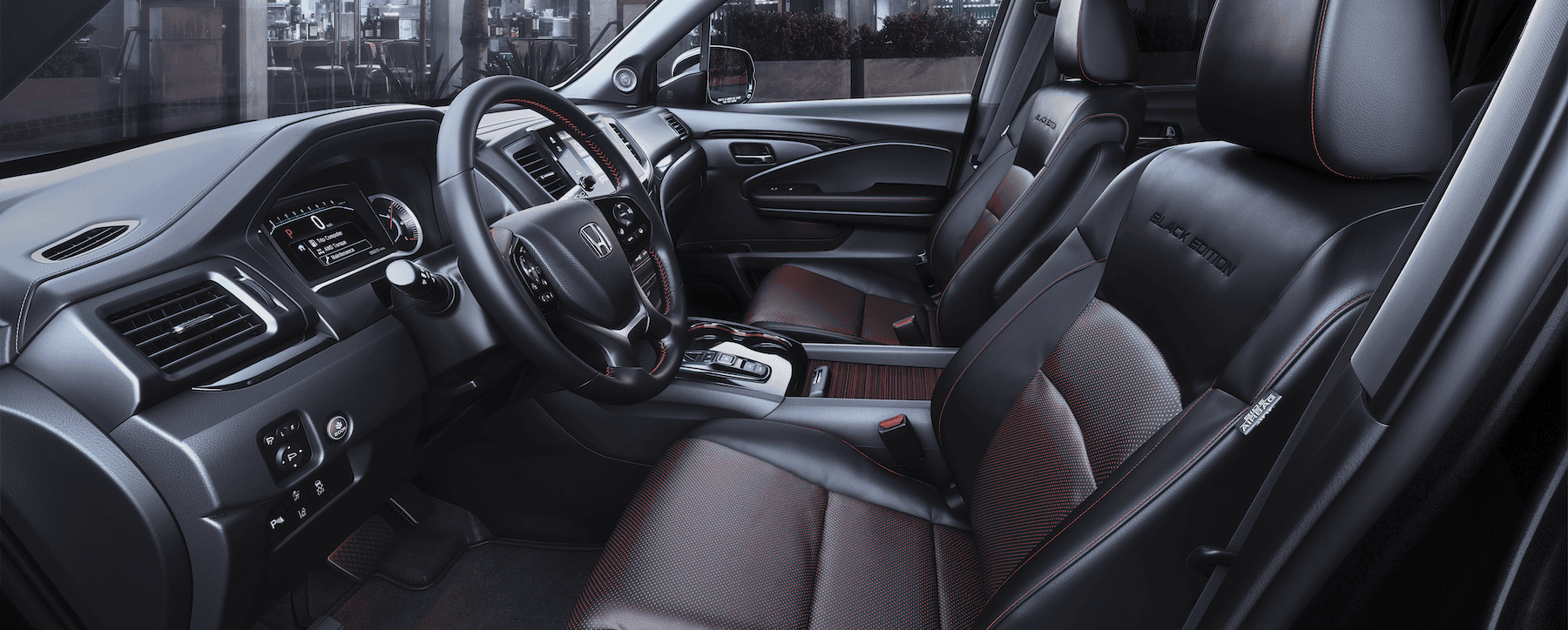 Compare the 2020 Honda Pilot and 2020 Subaru Ascent at Boch Honda of Norwood MA | The interior of the black honda pilot
