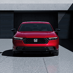 A front facing red Honda Accord