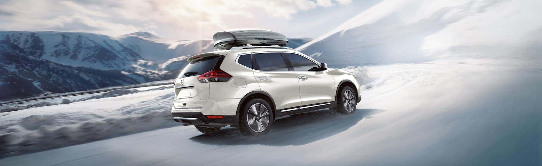 The 2020 Rogue model features at Boch Nissan South in North Attleboro | the 2020 rogue driving in the snow