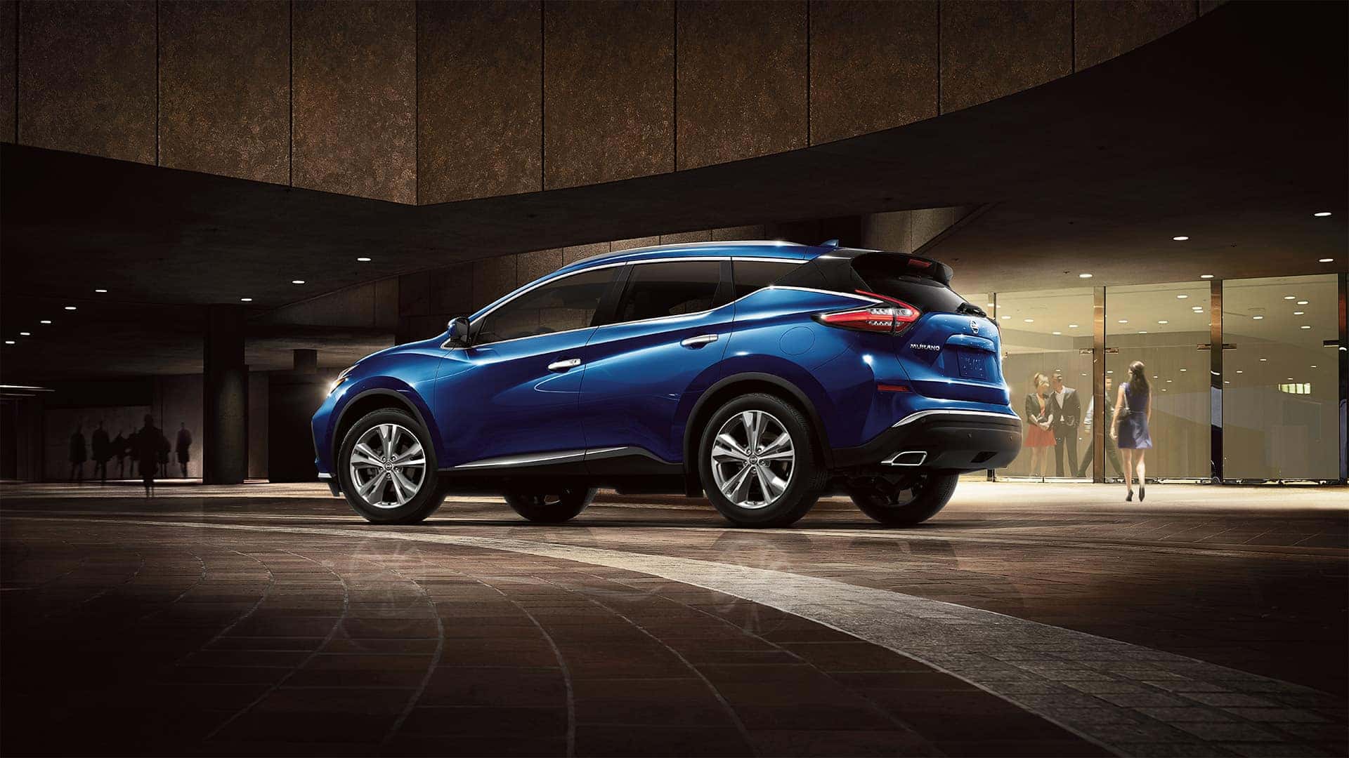 Boch Nissan South is a Family Owned Dealership near Cumberland, RI | Blue MY20 Nissan Murano parked in front of luxury mall store
