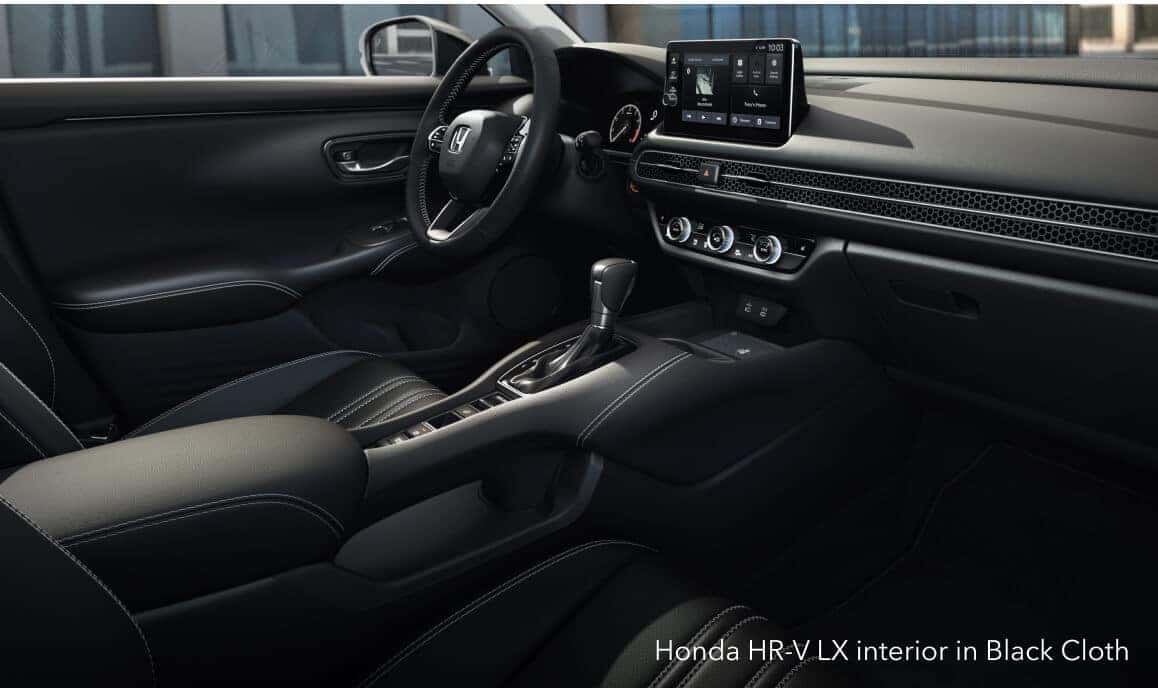 Honda HR-V LX showcasing its minimalist dashboard and touchscreen display.