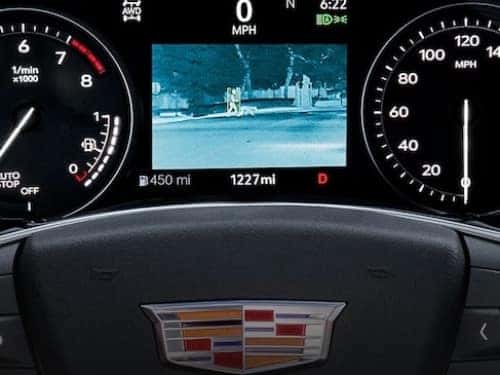 2024 Cadillac XT5 view of drivers dash displaying night vision camera view