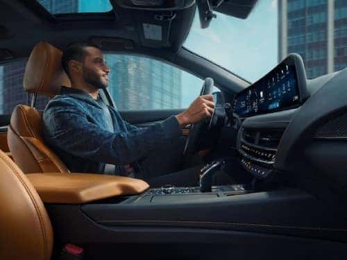 2025 Cadillac CT5 side interior view of man driving
