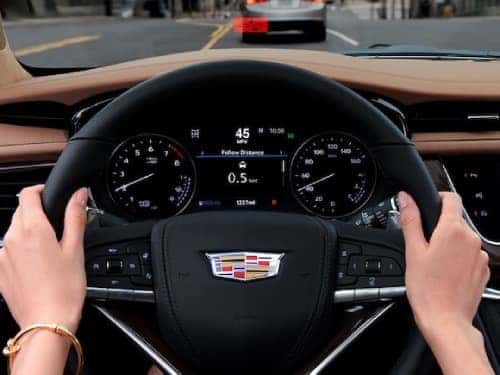 2025 Cadillac XT6 driver's dash showing following distance safety feature