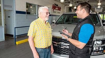 A Hendrick employee discussing trade in options