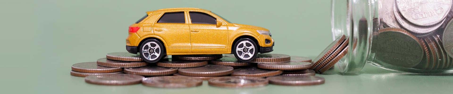 yellow car in a money jar