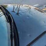 image showing hail damage to a vehicle
