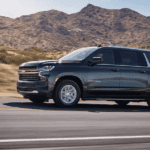 2021 chevy suburban black exterior driving down road