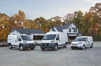 Ram Commercial Vans Lineup All angled in driveway facing camera
