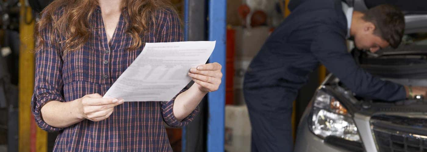 woman reviewing service bill