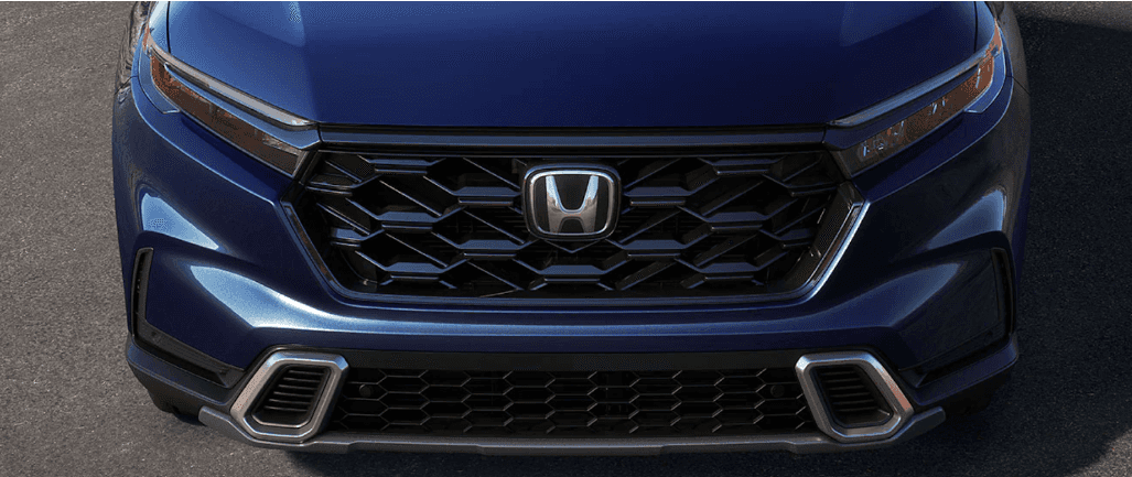 Close-up of a blue 2023 Honda CR-V front end