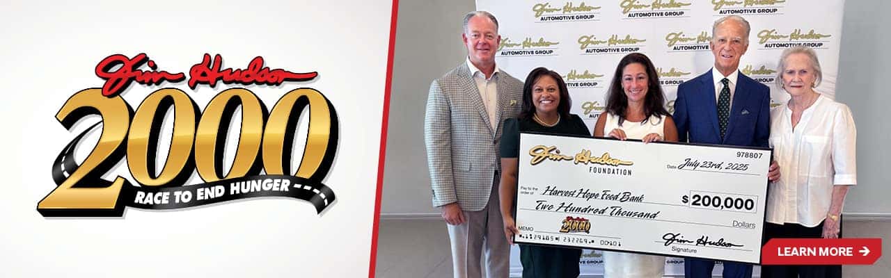 Harvest Hope 2024 charity check presented by Keith and Jim Hudson