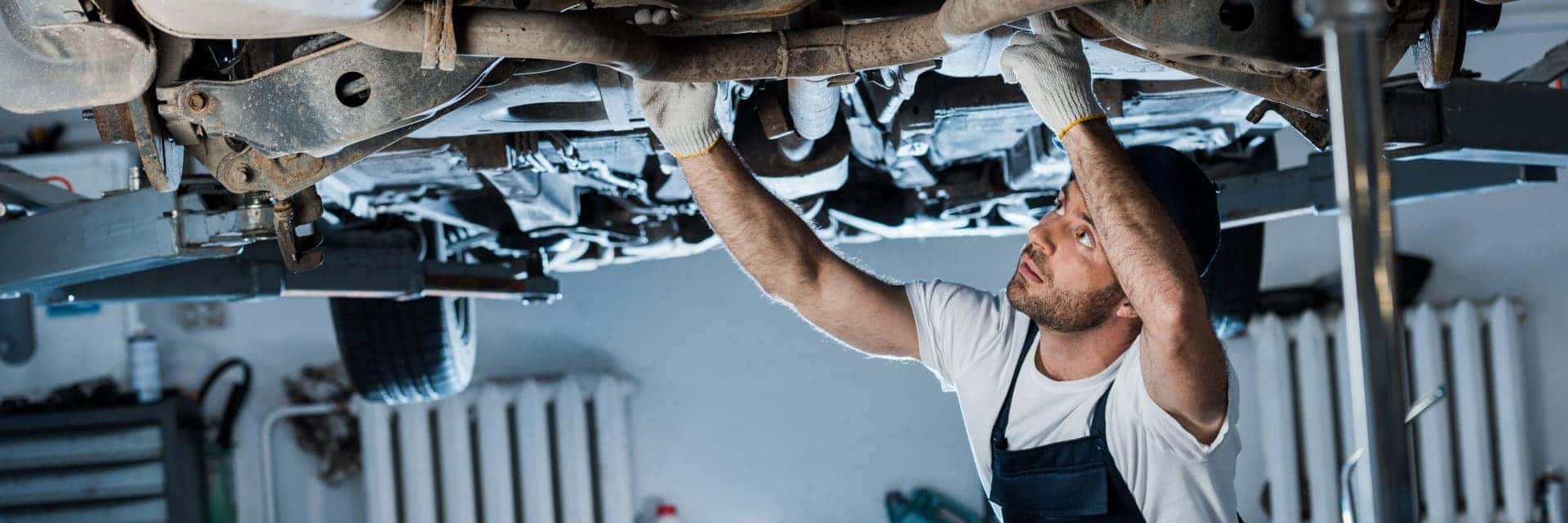 close up of technician working on vehicle
