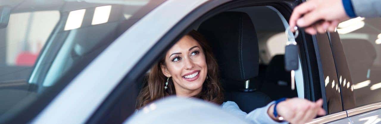 Nalley Honda Brunswick staff helps customers with a fair trade-in evaluation using state-of-the-art tools.