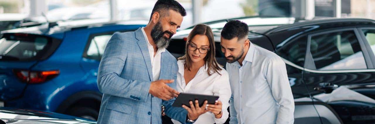 Friendly Nalley Honda Brunswick staff assisting a customer in choosing a new Honda at our Brunswick, GA, location.