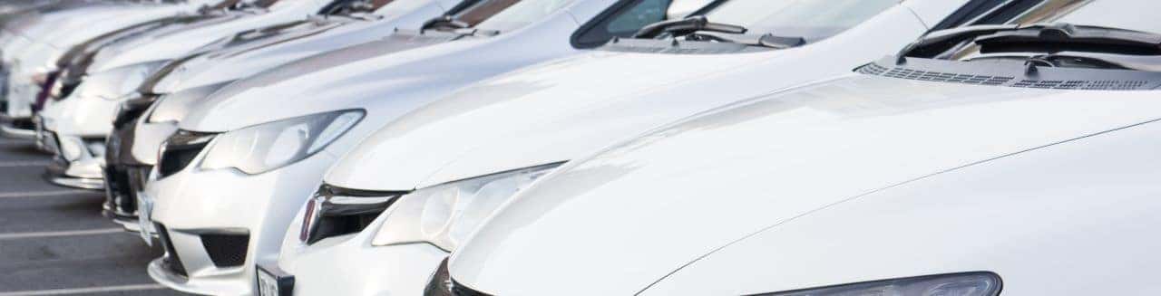 Nalley Honda Brunswick dealership exterior showcasing a variety of vehicles for sale near Waycross, GA.