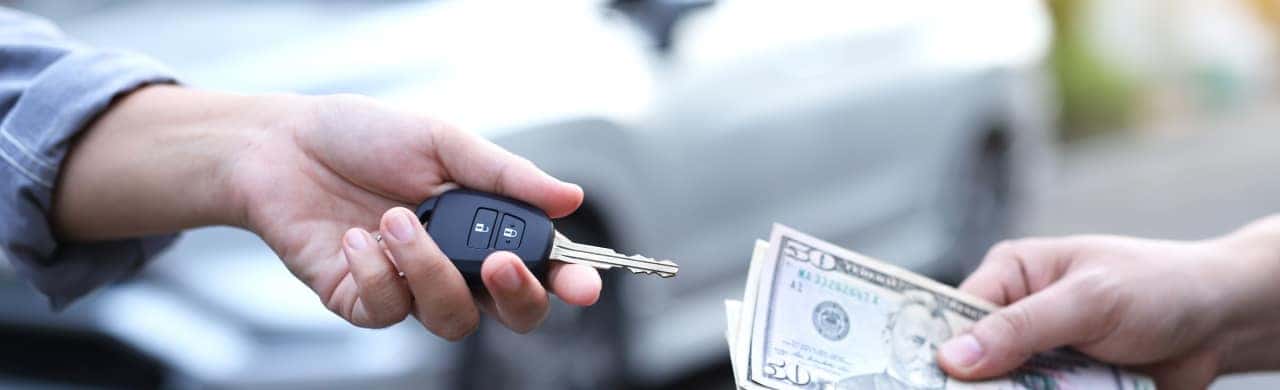 Used Honda vehicle being appraised on the dealership lot in Glynn County, Georgia