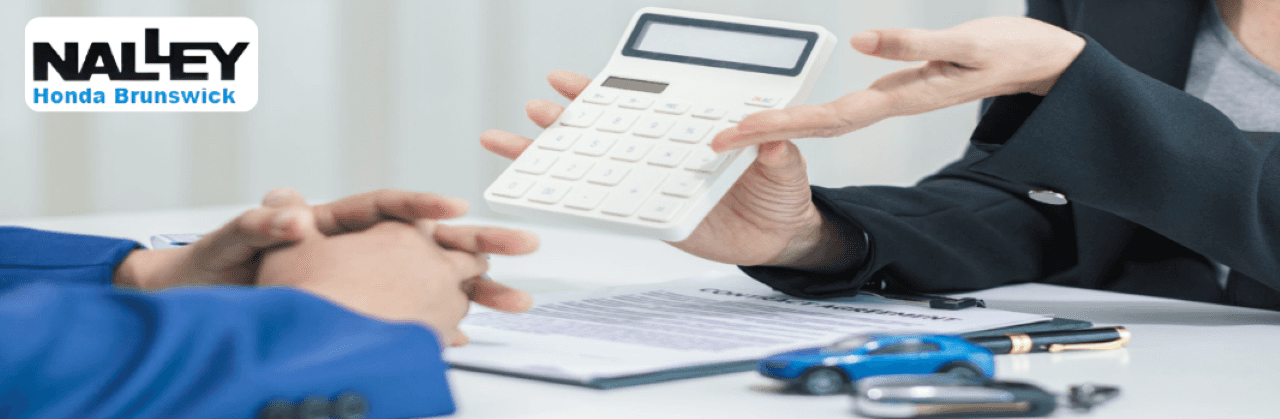 Comparison of Kelley Blue Book value estimate and Max Allowance genuine cash offer at a Brunswick car dealer