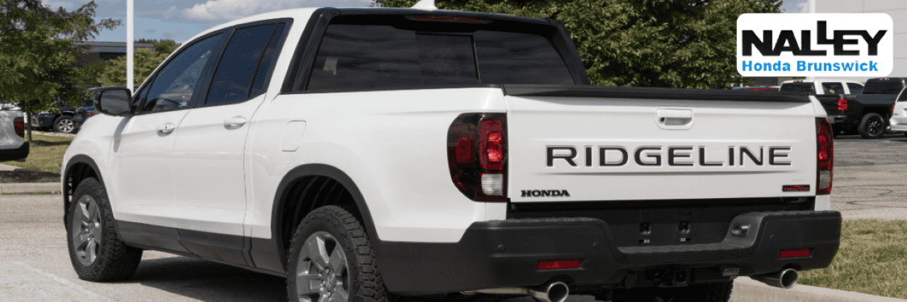Honda Ridgeline pickup truck parked outside Nalley Honda Brunswick dealership in Glynn County, GA