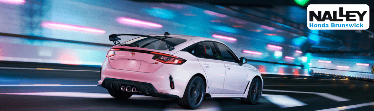 Honda Civic Type R in white displayed on dealership lot in Brunswick, GA with sporty exterior styling
