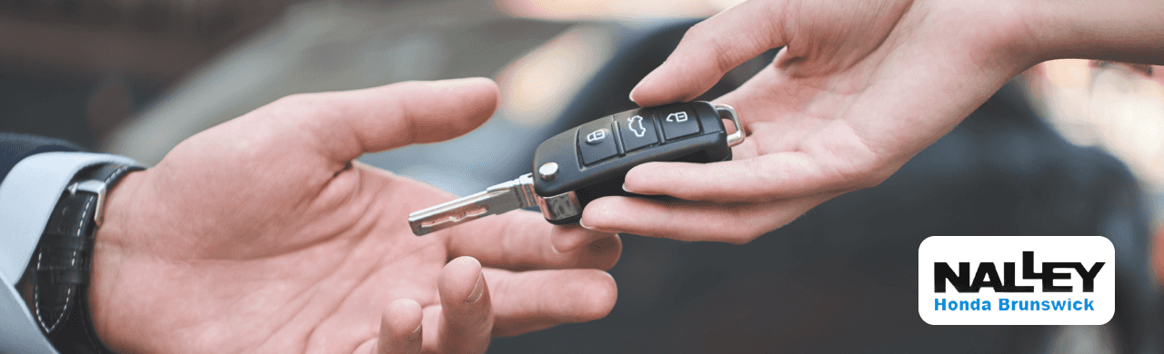 Nalley Honda Brunswick staff assisting a customer selling their car in Brunswick, GA.