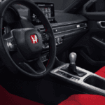 Interior shot of the Honda Civic showing advanced technology and safety features available at Nalley Honda Brunswick.