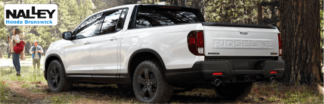 The 2024 Honda Ridgeline parked near a coastal Georgia trailhead, ready for off-road adventure.