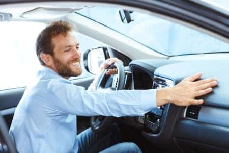 Man test driving a used car