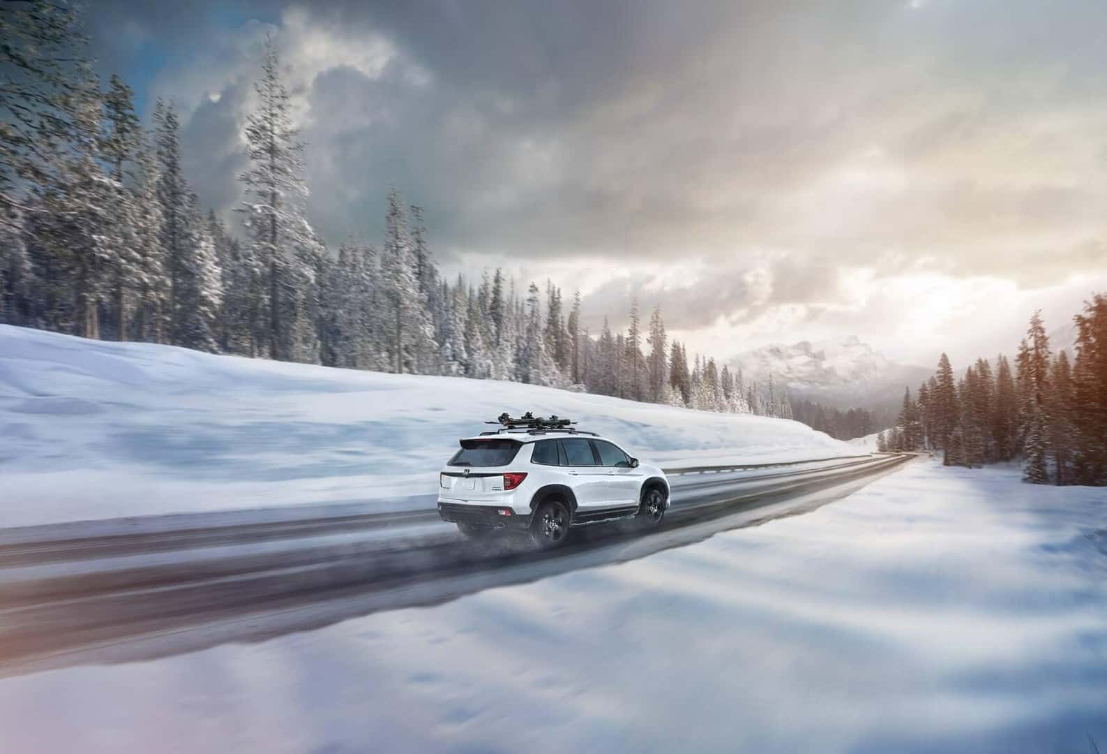 Honda Passport Elite in Snow