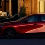 Red 2020 Mazda3 Hatchback Parked On City Street