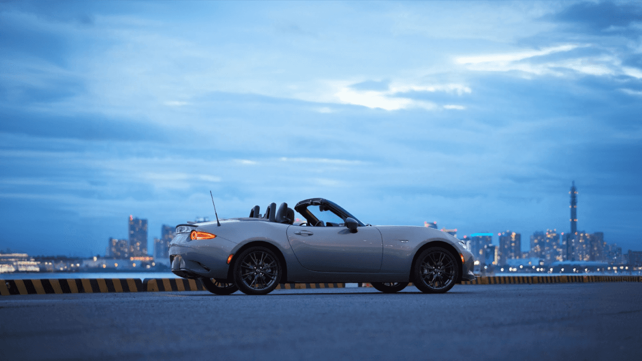 2026 Mazda MX-5 Miata parked in front of cityscape