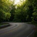 Scenic drive road photo by emmalee-couturier