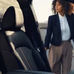 woman entering a 2024 Mazda CX-90